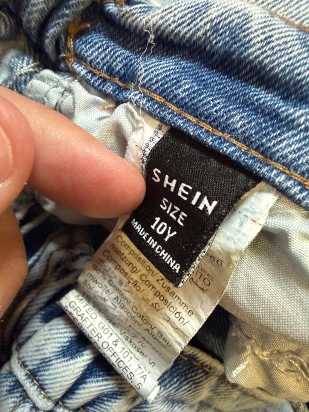 Light Wash Distressed Ripped Jeans - Picture 2 of 3